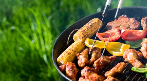 Food cooking on a BBQ